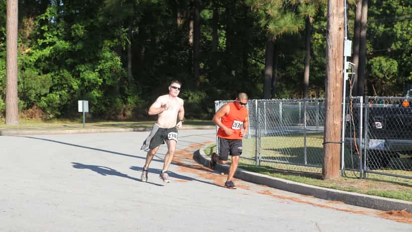 Runners competing in a half marathon, representing the risks of cardiac events during endurance events