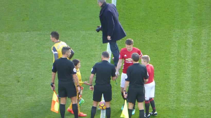 Manchester United players in action at Old Trafford during a Premier League match