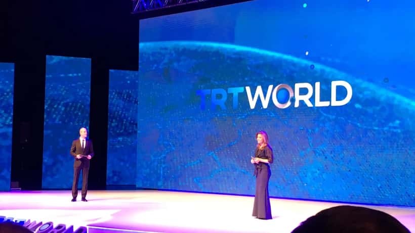 Turkish television channel launch event with broadcast screens and media equipment