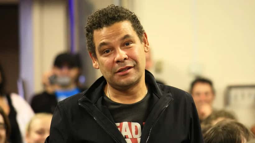 Person in bereavement counselling session in a warm London therapy room