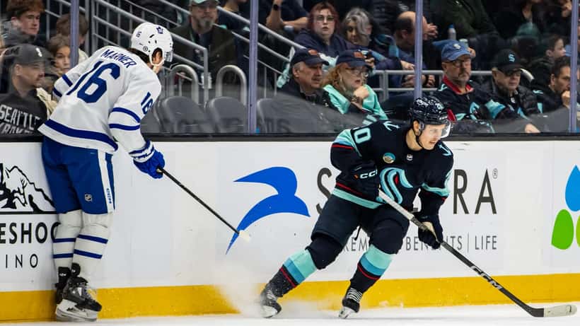 Mitchell Marner and Eeli Tolvanen in NHL action during the 2024 Seattle Kraken versus Toronto Maple Leafs game