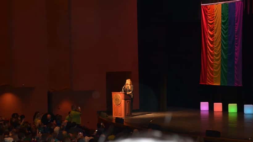 Laverne Cox speaking at a public event, April 2026, as her Apple TV film Outcome sparks legal name change questions in Canada