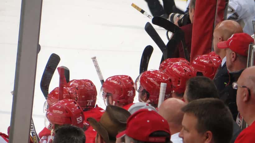 NHL ice hockey players on the bench during a Stanley Cup playoff match