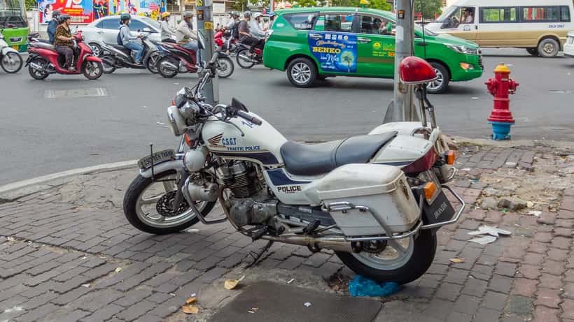 Police motorcycle patrolling Ho Chi Minh City Vietnam streets
