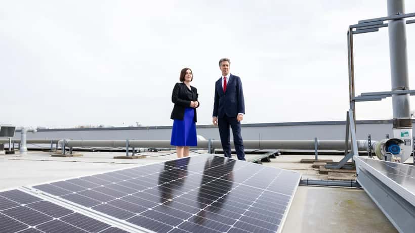 Bridget Phillipson and Ed Miliband visiting a school to view solar panels, representing UK education reform investment