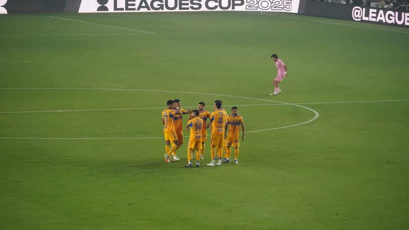 Tigres UANL players in action against Inter Miami CF during a cross-border soccer match, 2025