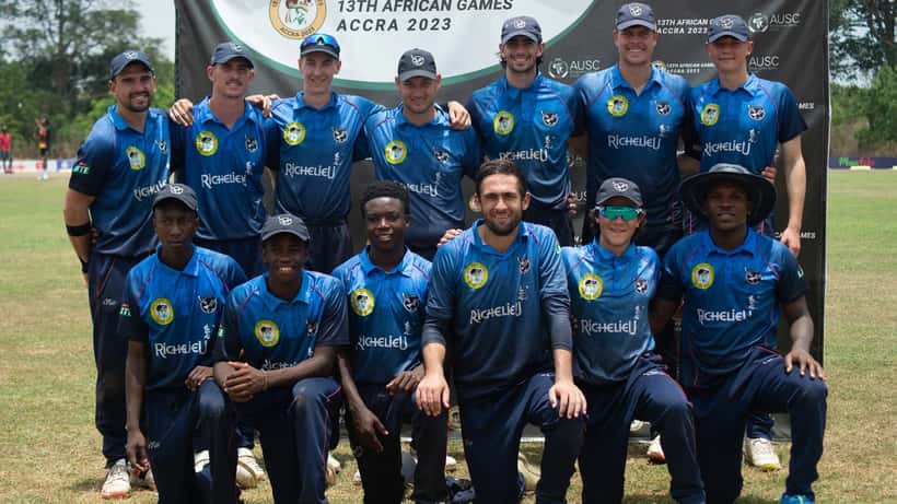 Cricket players competing at the African Games, action shot on the pitch