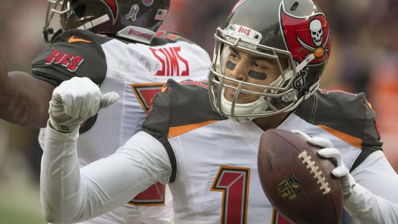 Mike Evans in action carrying the ball during an NFL game