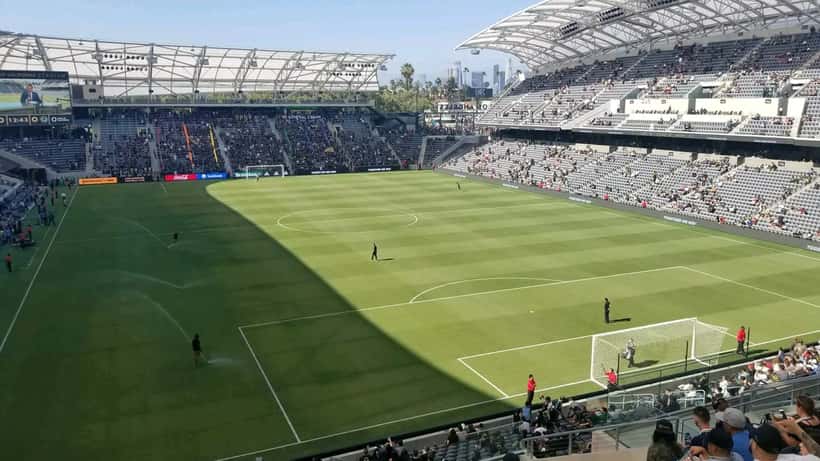 LAFC soccer players challenging for the ball in an MLS match