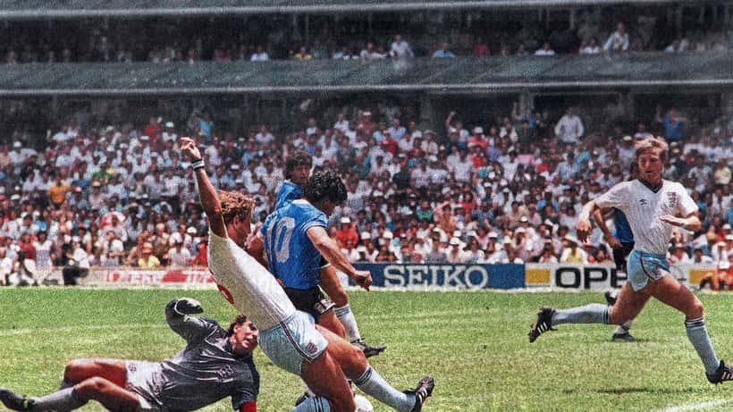 Maradona scoring the Hand of God goal past Peter Shilton England 1986 World Cup quarter-final