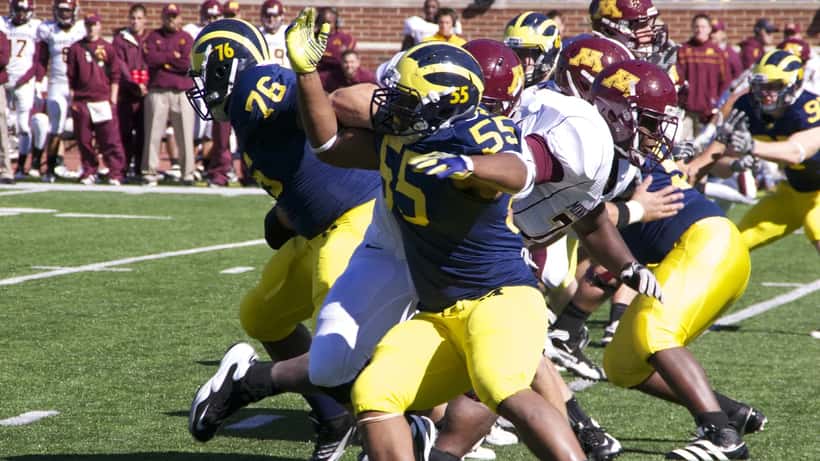 Minnesota Golden Gophers college football players in action during a Big Ten season opener