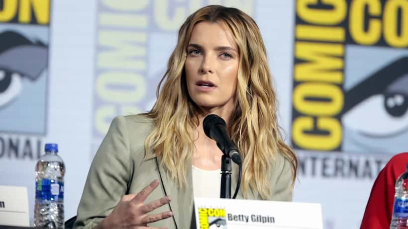 Betty Gilpin at a 2019 public event — her August 2026 comments on algorithm-driven TV have spotlighted creative burnout among Canadian performers