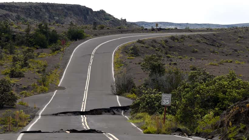 Earthquake-damaged road at Hawaii Volcano National Park showing seismic destruction