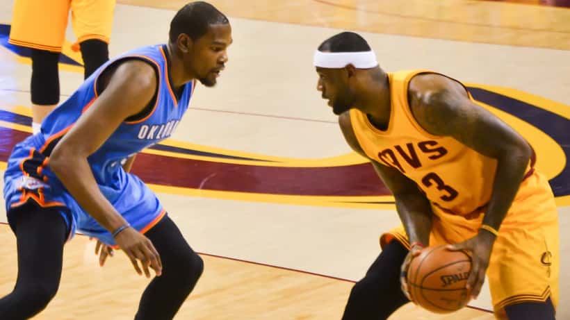 Kevin Durant confronts LeBron James in an NBA playoff game