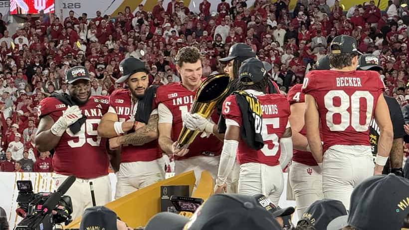 Indiana football players at a postgame trophy ceremony