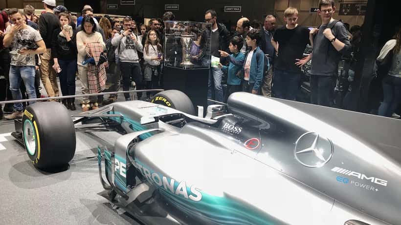 Lewis Hamilton in Formula 1 racing car, representing athletic longevity and sports performance