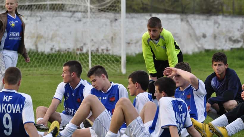 Kosovo national team young footballers training on a football pitch