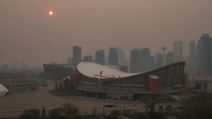 Downtown Calgary skyline blanketed in wildfire smoke during the July 2026 air quality event