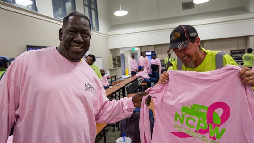 Pink breast cancer awareness ribbon at a fundraising event
