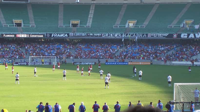 Football kick-off at an international match, representing the Australia vs Brazil friendly and sports betting tax implications in Canada