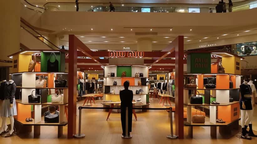 Miu Miu luxury clothing store display showcasing designer fashion items