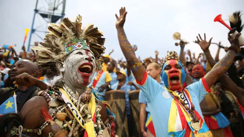 Congolese fans celebrating at an African football tournament final in Rwanda's national stadium