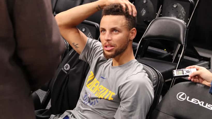 Stephen Curry talks to reporters, Wikimedia Commons CC BY-SA 4.0 by Cyrus Saatsaz