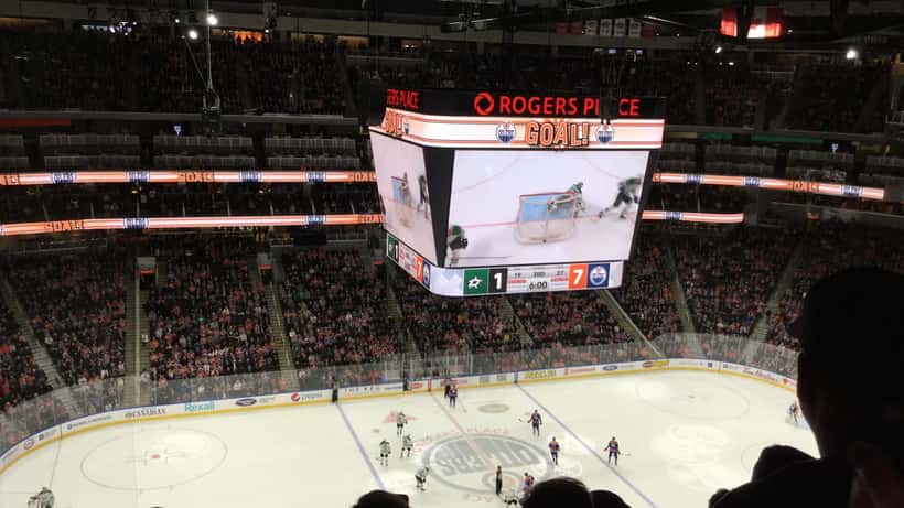 Rogers Place arena crowd during an Edmonton Oilers home game, illustrating season-ticket holder consumer rights