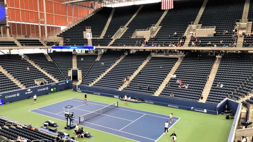 Australian tennis player practising at US Open Armstrong Stadium, outdoor hard court, New York