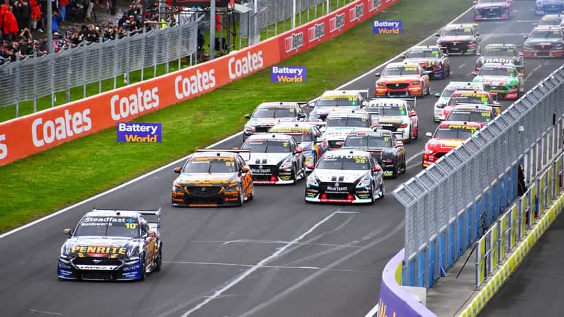 Racing cars competing at the 2022 Bathurst 1000 at Mount Panorama circuit in New South Wales