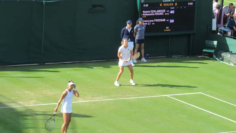 Ann Li competing in professional tennis at a Grand Slam tournament