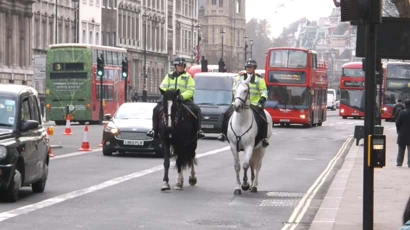 Mounted Metropolitan Police officers on patrol on Whitehall London during heightened security alert