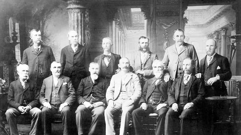 The Lizzie Borden trial jury photographed in 1893, twelve men seated in two rows in black and white