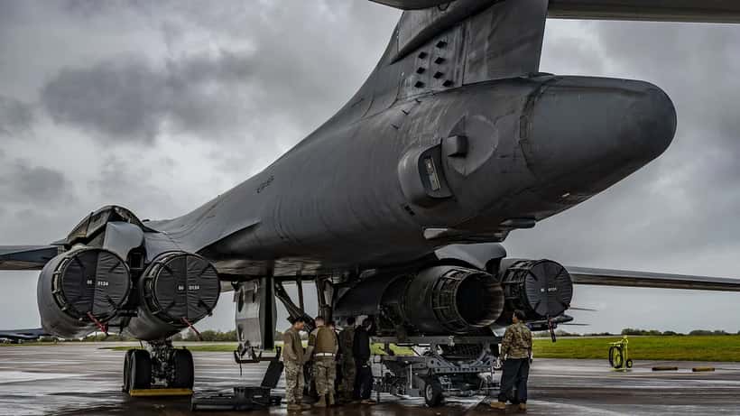 US Air Force airmen performing engine maintenance on a B-1 Lancer bomber at RAF Fairford, Gloucestershire