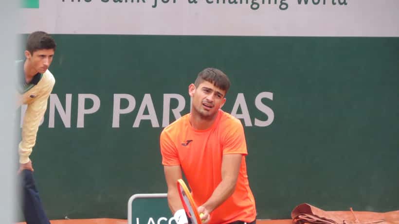 Mariano Navone in action at a professional tennis tournament, 2026