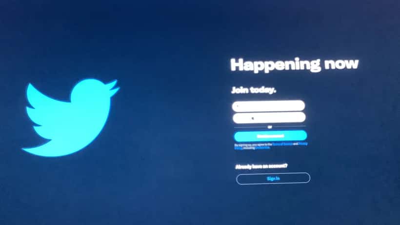 Social media platform home screen on a computer monitor representing digital connectivity and data privacy concerns