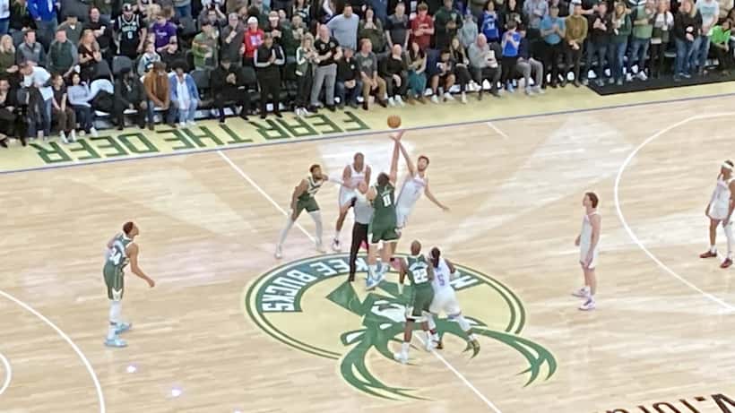 Oklahoma City Thunder vs Milwaukee Bucks opening tip-off at NBA arena 2024
