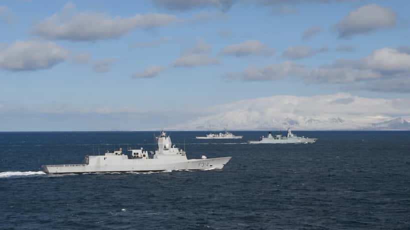 Royal Navy and allied frigates patrolling the North Atlantic Ocean during joint military operation
