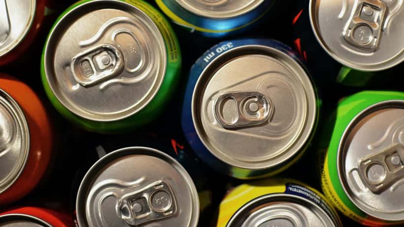 Multiple soda cans representing the Gen Z fridge cigarette Diet Coke trend