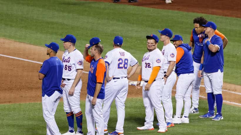 New York Mets baseball players celebrating after a win