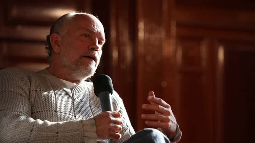 John Malkovich at a film festival press conference, linked to the fabricated quote defamation case 2026