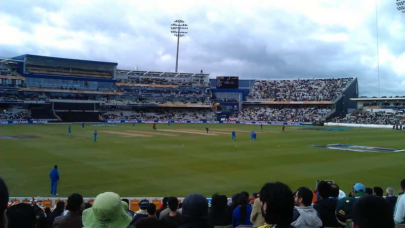 India vs Pakistan cricket match with players and stadium crowd