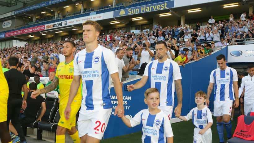 British solicitor reviewing a contract in a Cardiff law office, Georgian windows, legal bookshelf