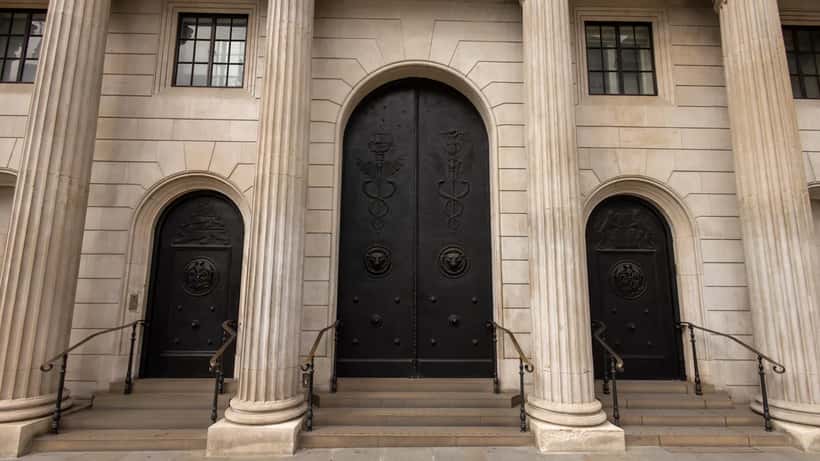 The entrance to the Bank of England building on Threadneedle Street, London