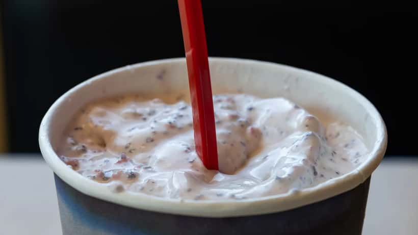 Cotton Candy Blizzard treat from Dairy Queen in a plastic cup, similar to the Halloween Oreo Blizzard