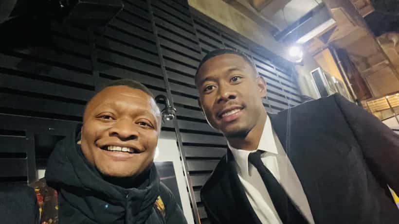 Real Madrid defender David Alaba with a supporter