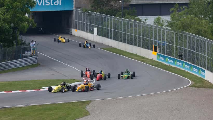 F1 racing cars competing at the Canadian Grand Prix circuit on race day