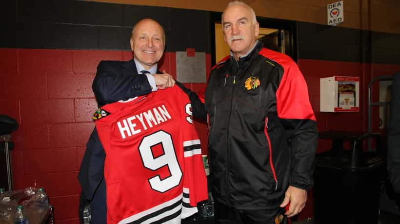 Joel Quenneville, Chicago Blackhawks coach, presenting a jersey to the US Ambassador to Canada