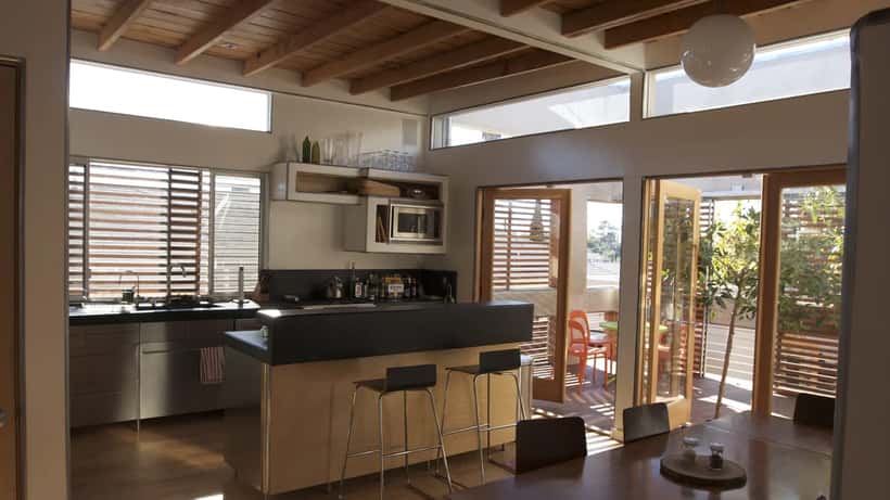 Modern kitchen with stone worktop surfaces, UK home renovation 2026