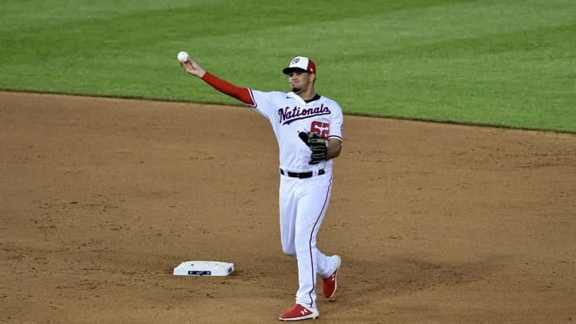 Luis García Jr. making a throw to first base during a Washington Nationals game